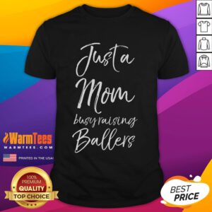 Alt Text: Cute Basketball Mother T-Shirt design featuring 'Just A Mom Busy Raising Ballers' slogan for proud basketball moms.