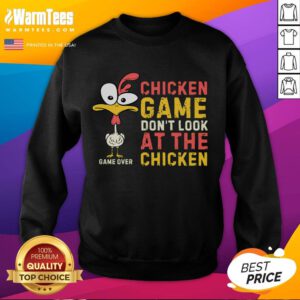 Funny chicken game sweatshirt featuring 'Don't Look At The Chicken' design, perfect for chicken family lovers and gamers.