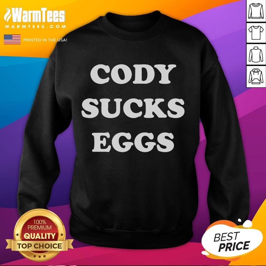Funny Cody Sucks Eggs sweatshirt featuring a humorous design, perfect for casual wear and egg lovers.