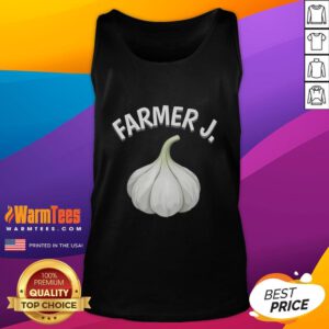 Funny Farmer J wearing a garlic-themed tank top, showcasing humor and farming style in a vibrant outdoor setting.