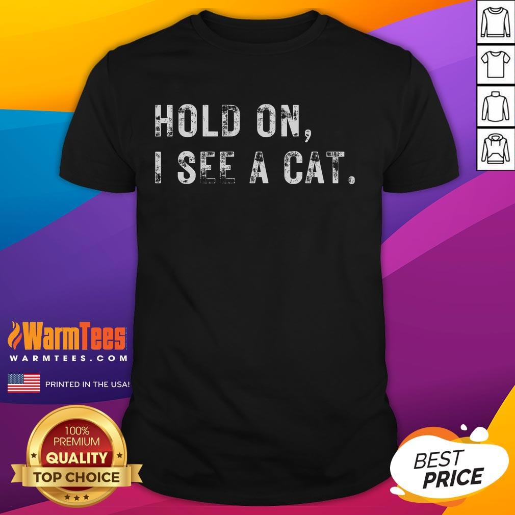 Funny Hold On I See A Cat T-Shirt for cat lovers featuring a playful cat graphic and humorous text design.