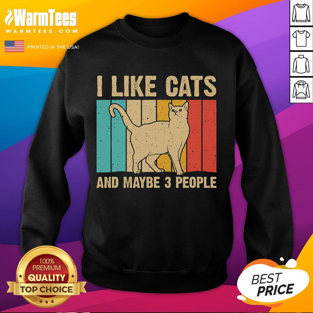 Funny vintage sweatshirt featuring 'I like cats and maybe 3 people' text design, perfect for cat lovers and retro fashion.