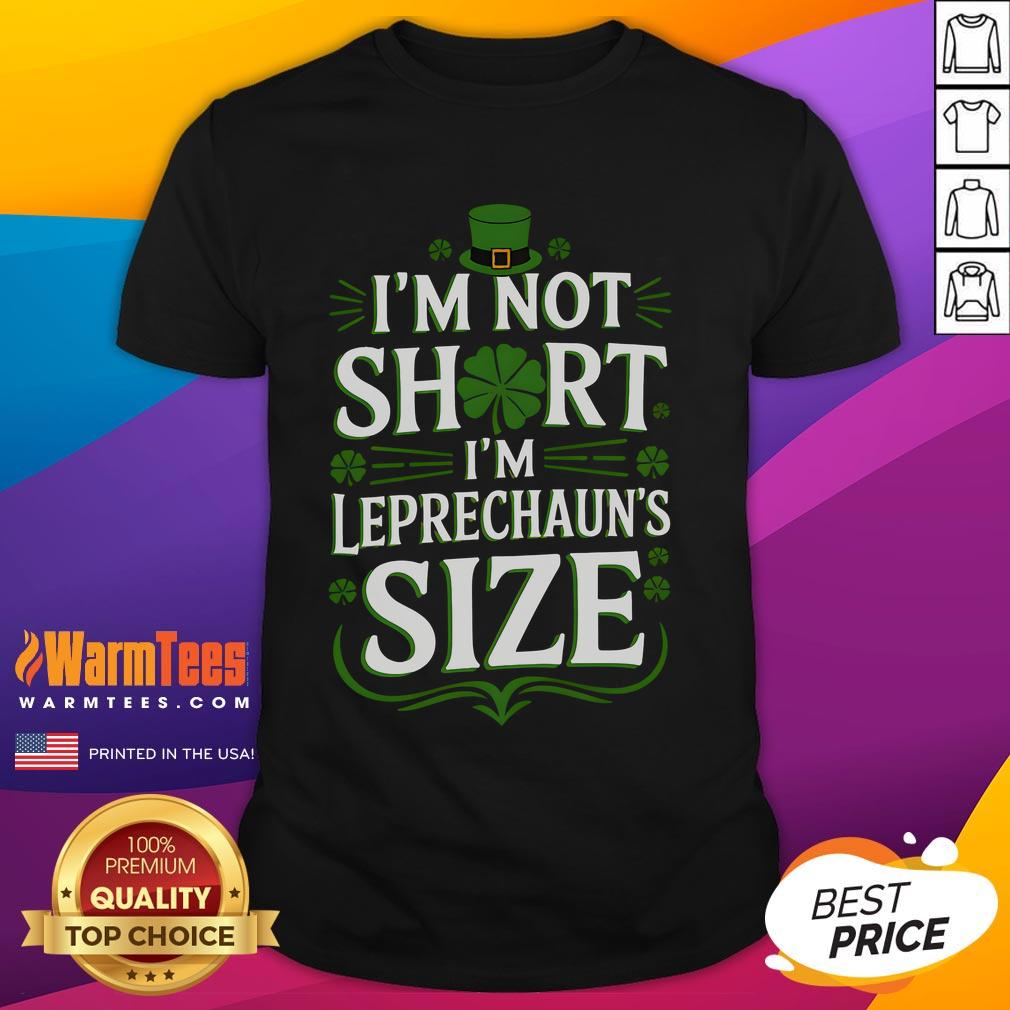 Funny St Patrick's Day T-shirt saying 'I'm Not Short, I'm Leprechaun Size' with vibrant green graphics and playful font.