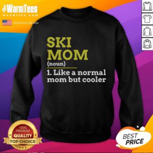 Funny skiing mom wearing a 'Cooler Than Normal Mom' sweatshirt, showcasing her playful style on the slopes.