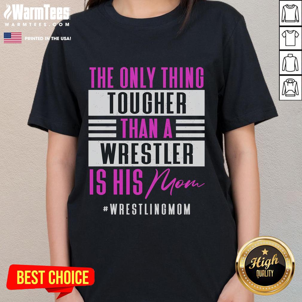 Funny ladies tee featuring 'The Only Thing Tougher Than A Wrestler Is His Mom' design, perfect for wrestling fans.