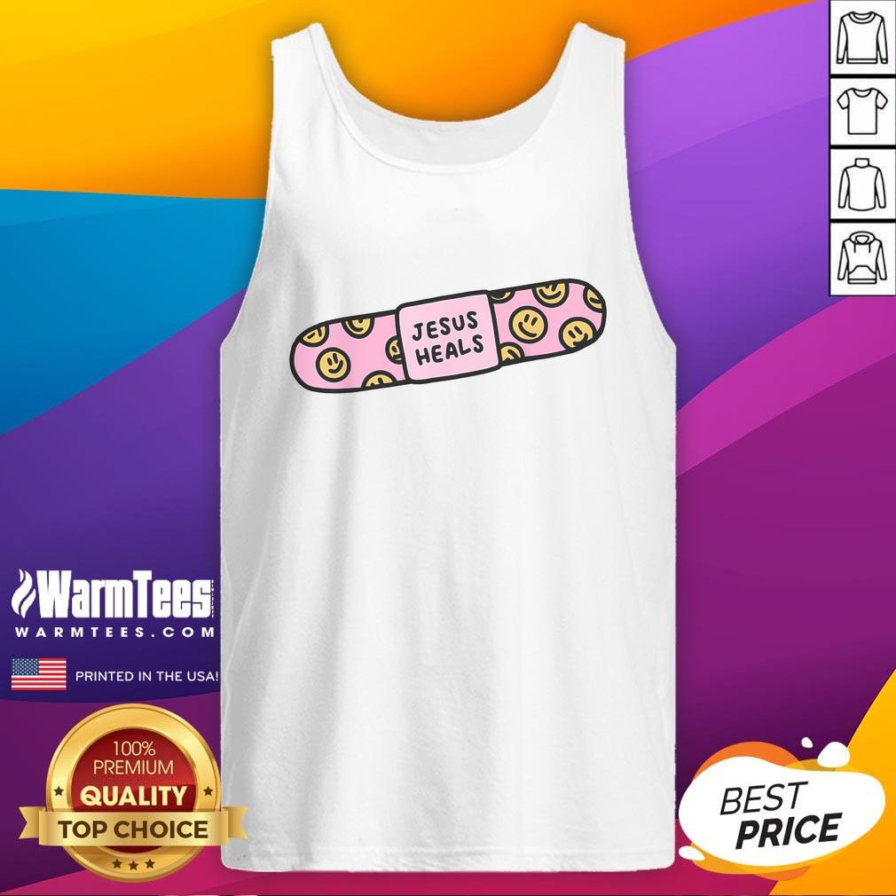 Christian faith healing tank top featuring 'Good Jesus Heals' and a bandaid graphic, inspired by Bible verses.