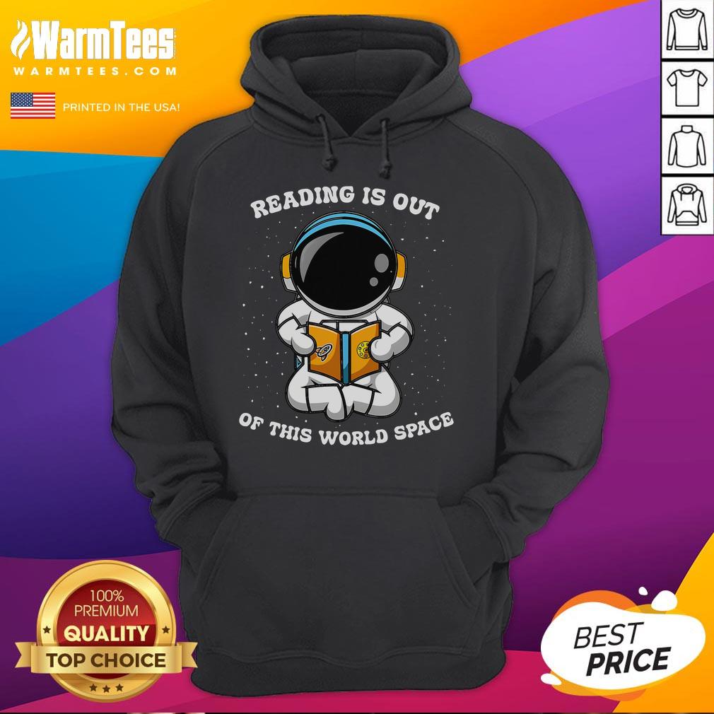 Alt Text: Cute astronaut in a space-themed hoodie reading a book, showcasing the 'Reading Is Out Of This World' design.