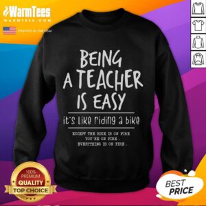 Funny 'Being a Teacher is Easy Like Riding a Bike' sweatshirt design featuring playful graphics and vibrant colors.