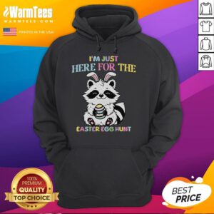Funny 'I'm Just Here for the Easter Egg Hunt' raccoon hoodie design featuring a playful raccoon graphic for Easter.