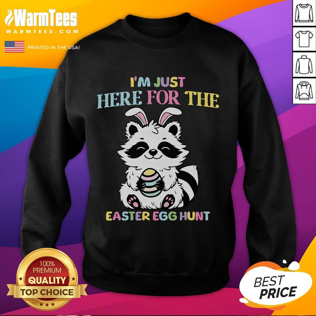 Funny 'I'm Just Here for the Easter Egg Hunt' raccoon sweatshirt design featuring a playful raccoon illustration.