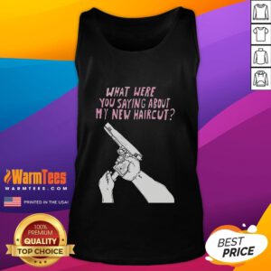 Funny Matt Gray wearing a tank top with a humorous take on his new haircut, showcasing a playful style.