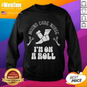 Funny wound care nurse sweatshirt saying 'I'm On A Roll' featuring a playful design for healthcare professionals.