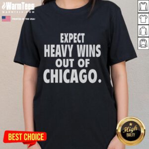 Good Expect Heavy Wins Out of Chicago Ladies Tee showcasing a stylish design perfect for womens casual wear.