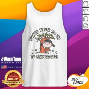 Adult wearing 'Nice Never Too Old To Play Outside' tank top, enjoying the outdoors with a smile and vibrant nature backdrop.