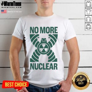 Alt Text: Official No More Nuclear Greenpeace T-Shirt featuring bold graphics promoting nuclear disarmament and environmental activism.