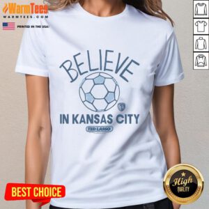Alt Text: Official Ted Lasso Believe X Sporting Kansas City ladies tee in vibrant colors, perfect for fans and casual wear.