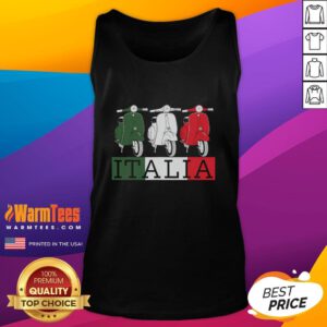 Alt Text: Vespa moped rider wearing an Italian flag tank top, showcasing Italy's vibrant culture and scooter lifestyle.