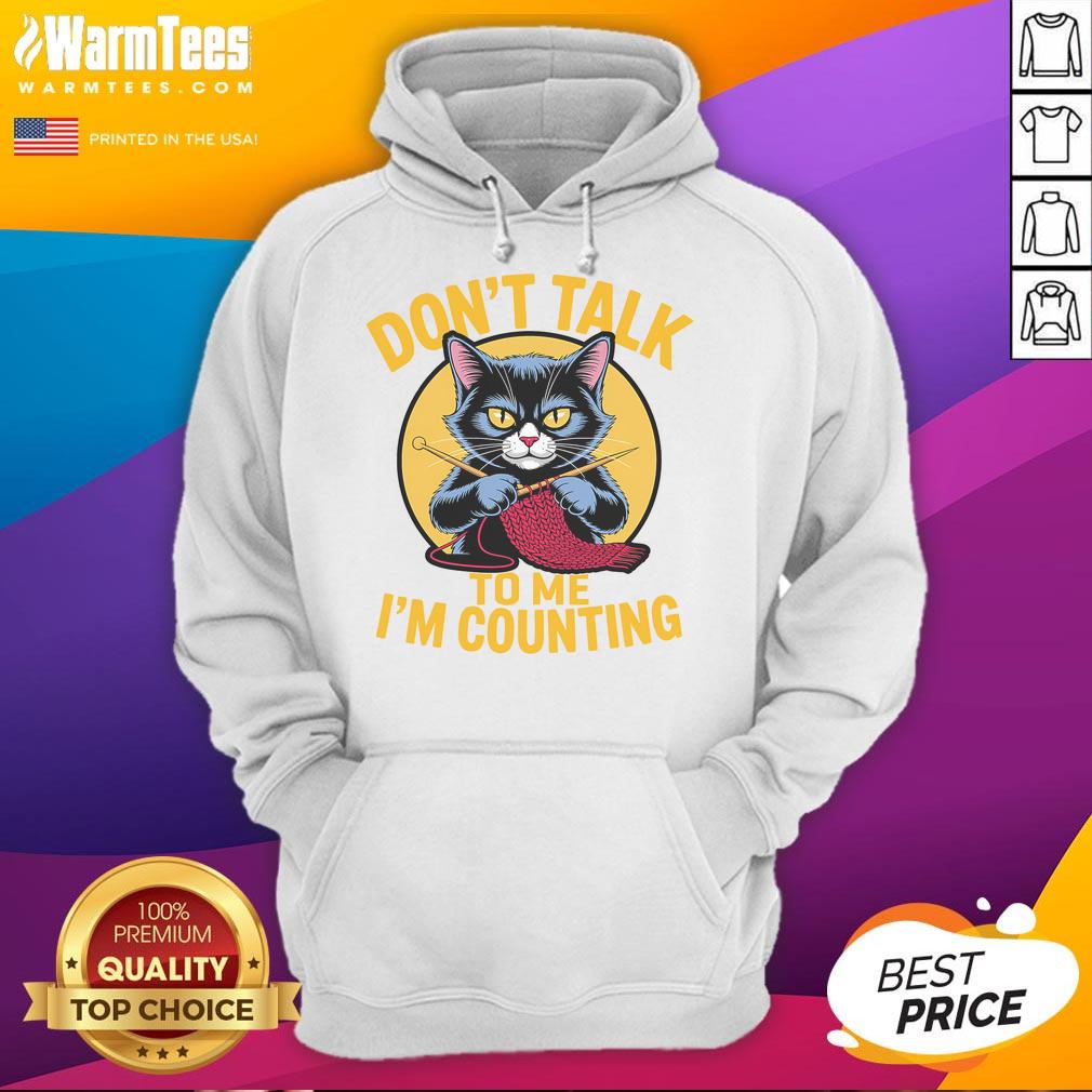 Cute cat in a cozy hoodie with Dont Talk to Me, Im Counting knitting design, perfect for knit lovers and cat enthusiasts.