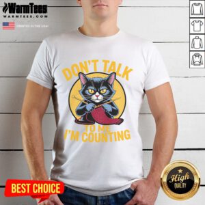 Alt Text: Cute cat graphic on a knitting-themed t-shirt saying Don't talk to me, I'm counting for knitting lovers.