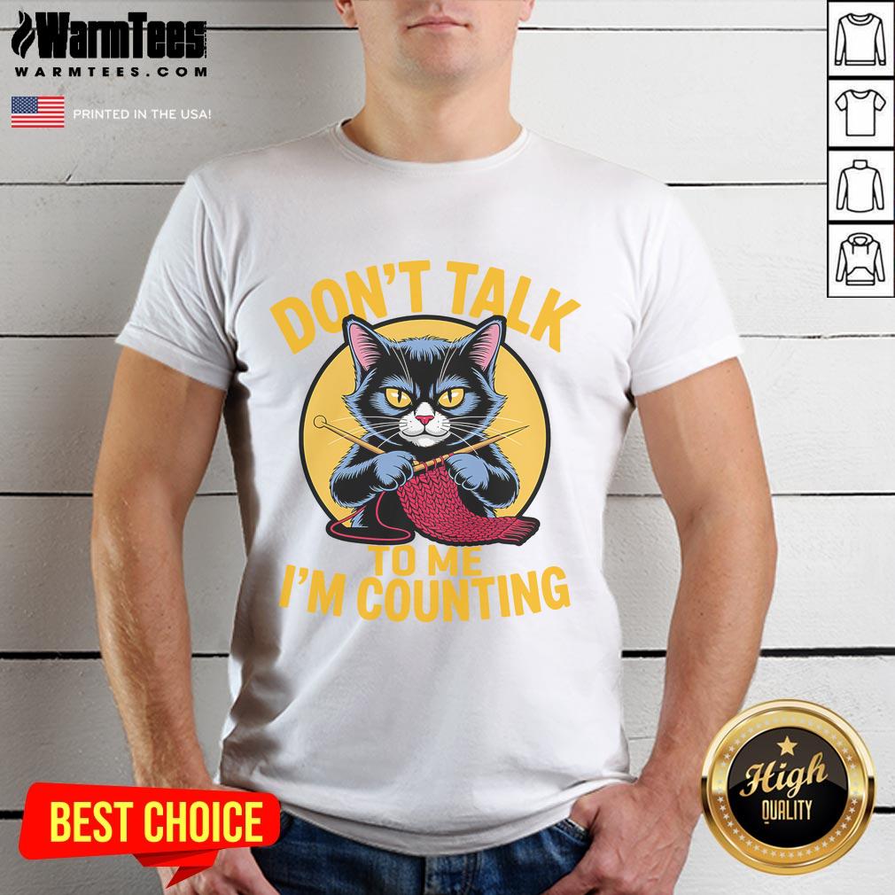 Alt Text: Cute cat graphic on a knitting-themed t-shirt saying Don't talk to me, I'm counting for knitting lovers.