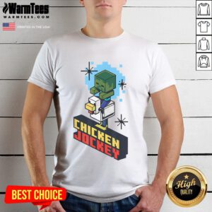 Cute chicken jockey graphic on a vintage t-shirt, showcasing a whimsical design perfect for animal lovers.