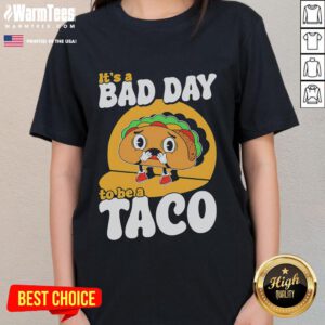 Alt Text: Cute 'It's A Bad Day To Be A Taco' ladies tee showcasing fun taco-themed graphic design for casual wear.