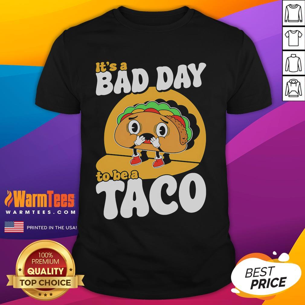 Alt Text: Cute It's A Bad Day To Be A Taco T-Shirt featuring playful taco graphics, perfect for taco lovers and humor enthusiasts.