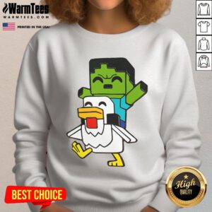 Alt Text: Adorable Minecraft baby zombie chicken jockey sweatshirt featuring vibrant graphics and cozy design for fans.