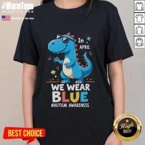 Cute T-Rex dinosaur wearing sunglasses on a ladies tee, promoting autism awareness and fun style.