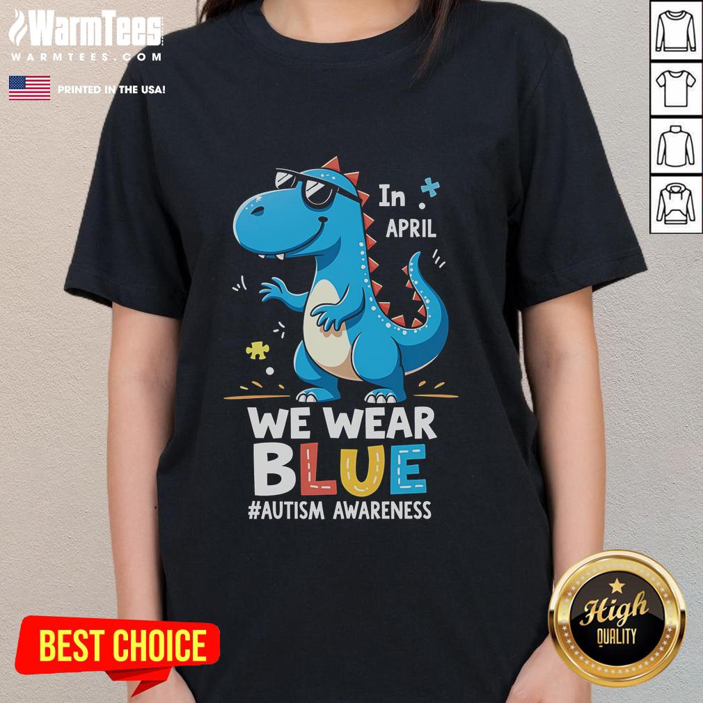 Cute T-Rex dinosaur wearing sunglasses on a ladies tee, promoting autism awareness and fun style.
