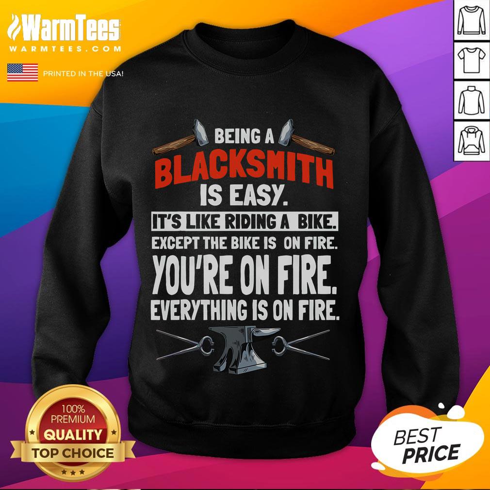 Alt Text: Humorous sweatshirt design saying Being a Blacksmith is Easy with fire graphics, perfect for blacksmith enthusiasts.