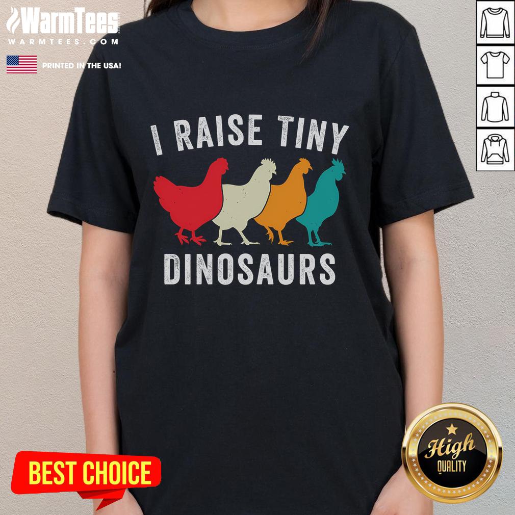 Funny chickens in a backyard setting, showcasing tiny dinosaurs, perfect for chicken lovers and homestead enthusiasts.
