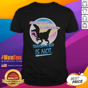 Funny dinosaurs graphic t-shirt with the slogan 'Cool Transphobia Is Not' promoting inclusivity and humor.