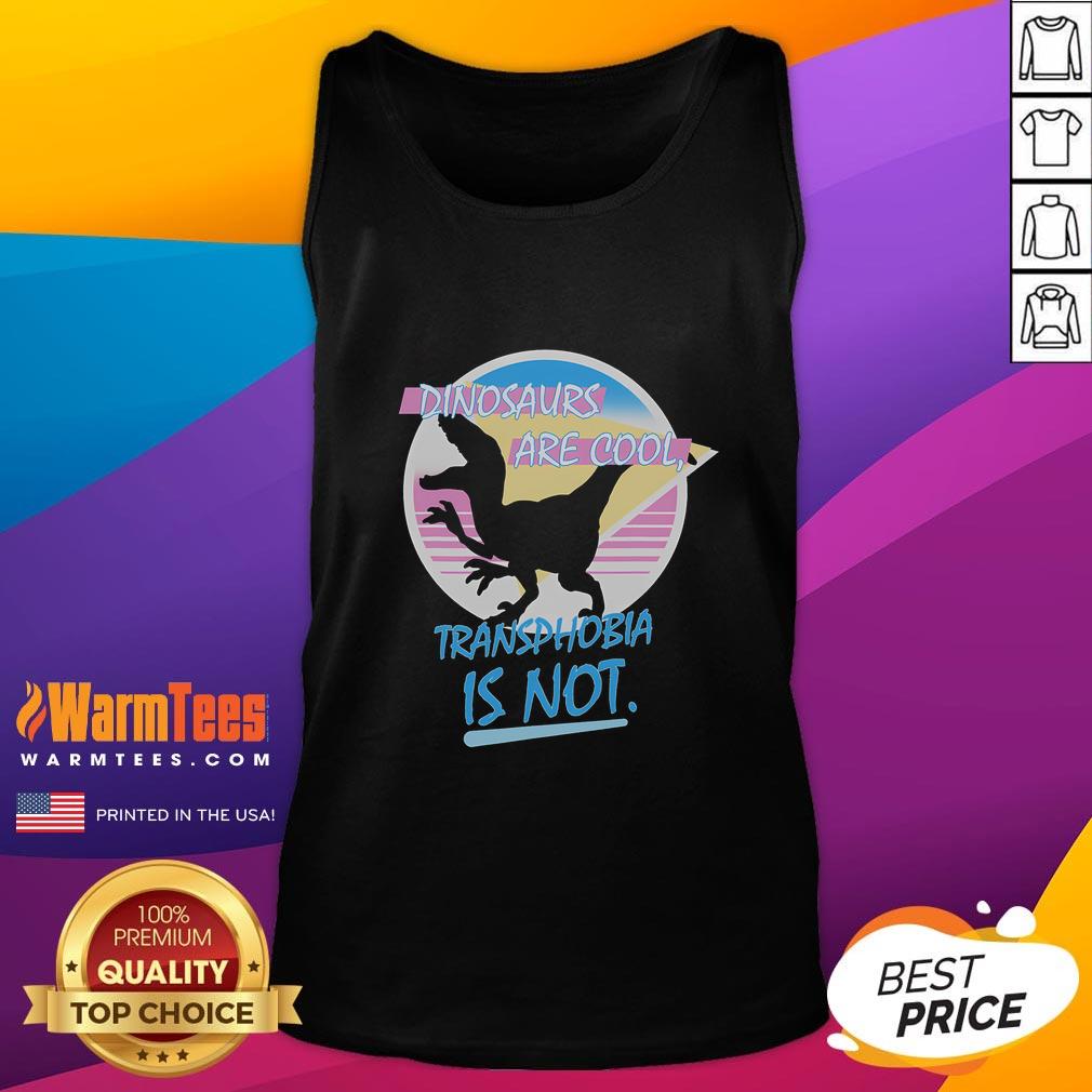 Funny dinosaurs graphic on a tank top with the message 'Dinosaurs Are Cool, Transphobia Is Not' promoting inclusivity.