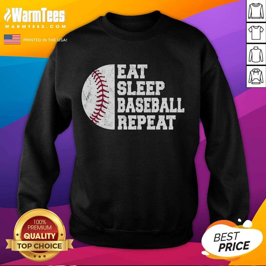 Funny Eat Sleep Baseball Repeat sweatshirt worn by a baseball player, showcasing a playful take on baseball life.