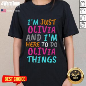 Funny 'I'm Just Olivia and I'm Here to Do Olivia Things' ladies tee design featuring playful typography on a casual shirt.