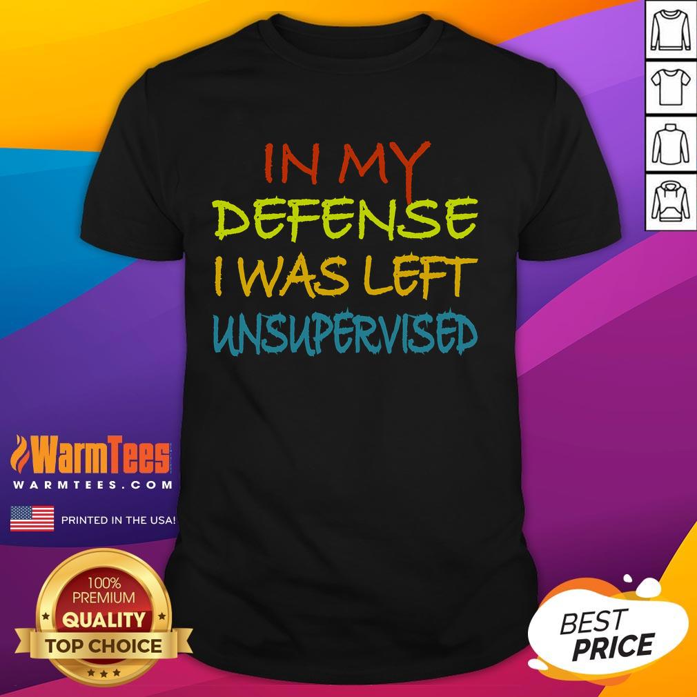 Alt Text: Funny In My Defense I Was Left Unsupervised cool t-shirt design featuring bold text and a playful graphic.