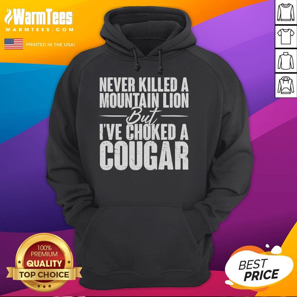 Funny Never Killed A Mountain Lion But I've Choked A Cougar Hoodie design featuring a playful graphic and bold text.