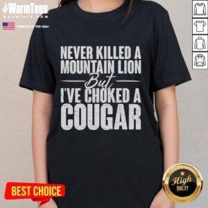 Alt Text: Funny Never Killed A Mountain Lion But I've Choked A Cougar Ladies Tee featuring humorous graphic design.