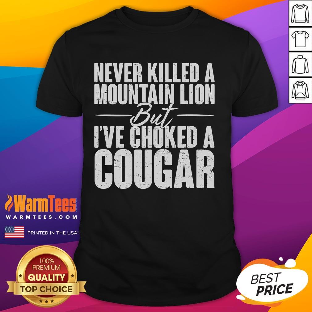 Funny Never Killed A Mountain Lion But I've Choked A Cougar T-Shirt design featuring a humorous graphic and bold text.