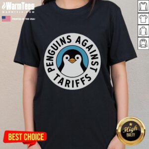 Alt Text: Funny penguin protest graphic on ladies tee, featuring penguins resisting tariffs in a humorous design.