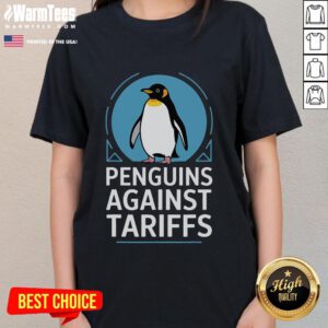 Funny penguins protesting against tariffs on a ladies tee, showcasing a humorous take on anti-tariff activism.