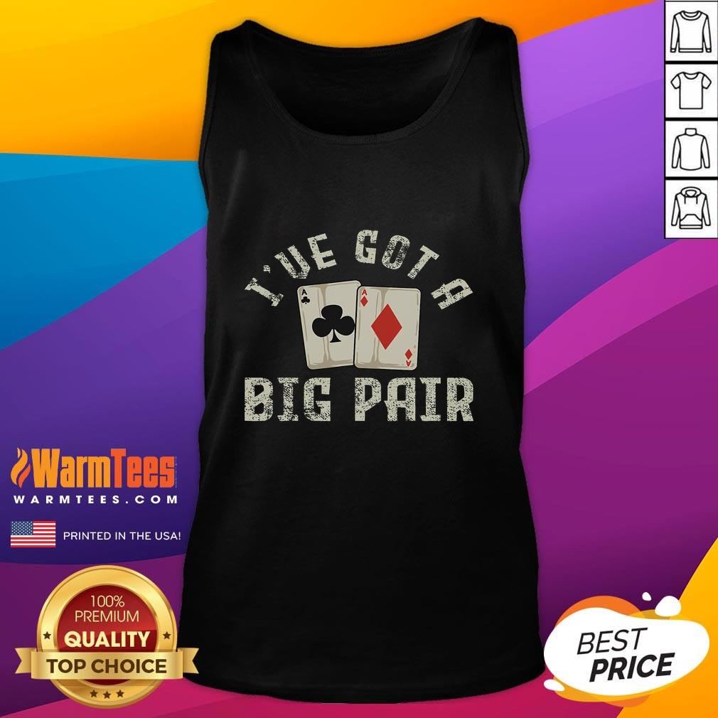 Funny poker card player wearing a gambling tank top, smiling at the table during an exciting game of poker.