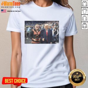 Wyatt Hendrickson, USA Wrestling legend, wearing a stylish ladies tee featuring Donald Trump as the best boss in business.