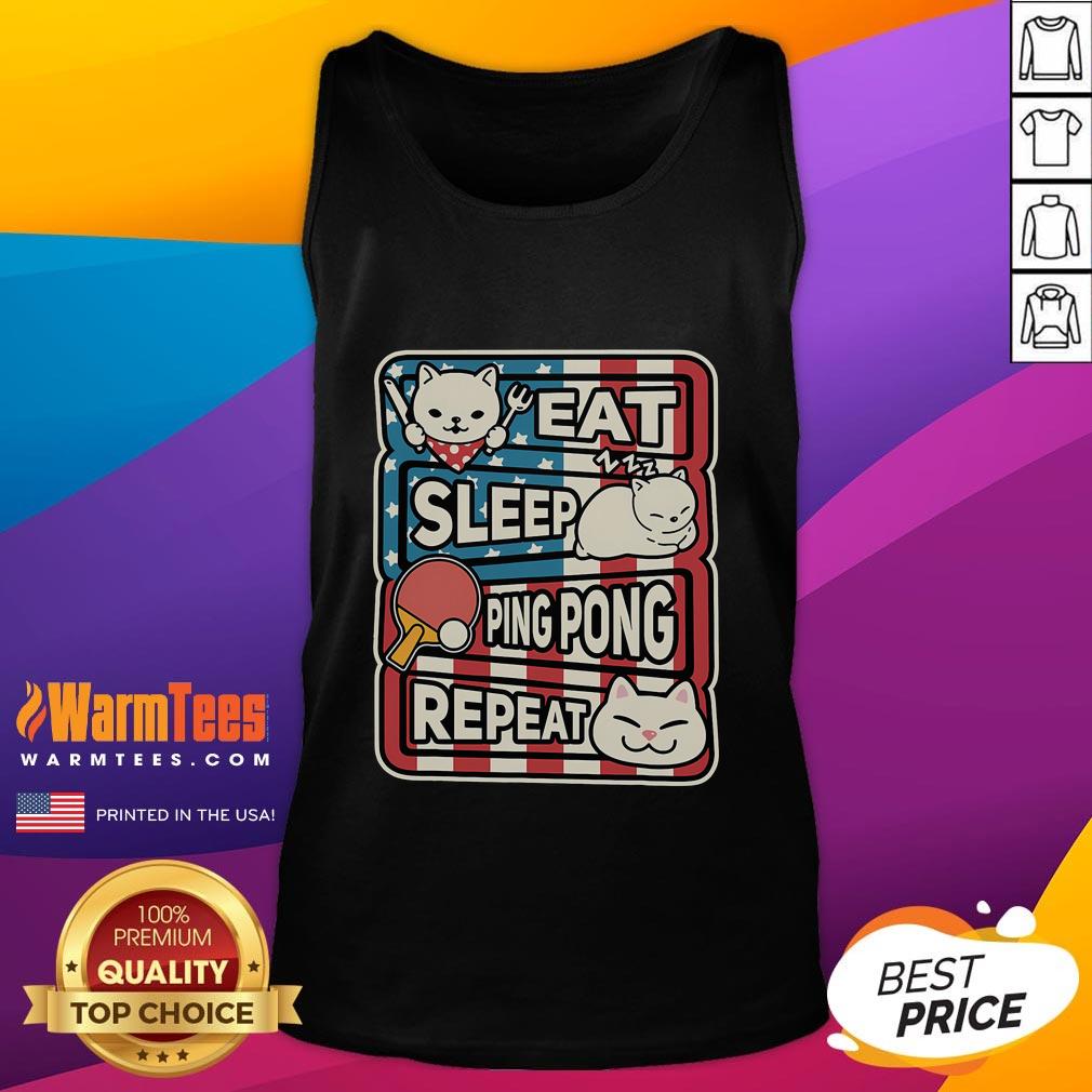 Cute cat in a patriotic tank top playing ping pong, embodying the 'eat, sleep, ping pong, repeat' lifestyle.