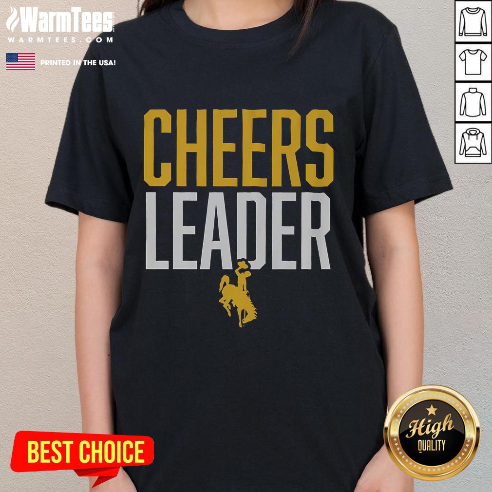 Wyoming Cowboys cheerleader ladies in stylish tees, showcasing team spirit and school pride at a game event.
