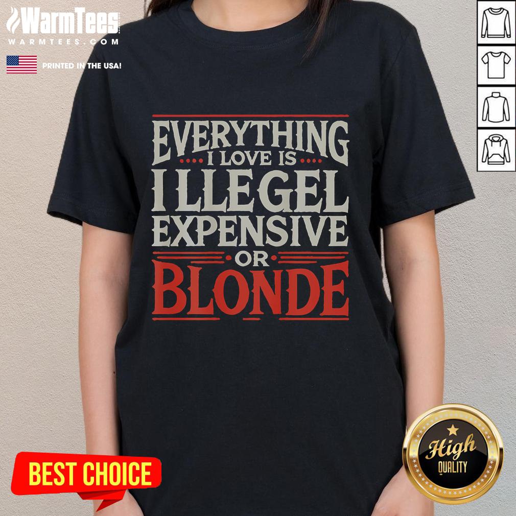 Alt Text: Stylish blonde model wearing the Everything I Love is Illegal Expensive or Blonde ladies tee, showcasing trendy fashion.