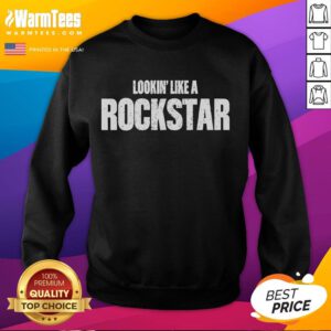 Josh Ross wearing a stylish 'Lookin Like A Rockstar' sweatshirt, showcasing a trendy and casual look.