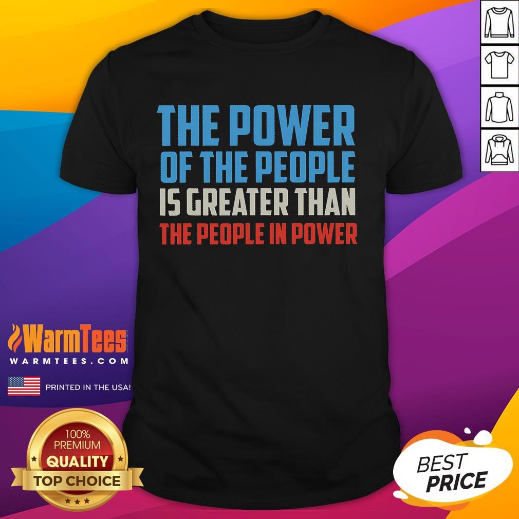Official The Power Of The People Is Greater Than The People In Power T-Shirt design featuring bold text and graphic elements.