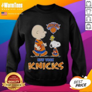Cute Peanuts New York Knicks sweatshirt featuring Charlie Brown and friends in team colors, perfect for fans.